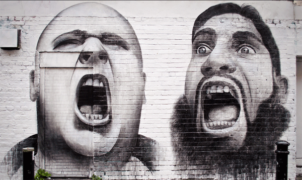 Gritos.. Graffiti pintado en una pared de la calle Hanbury Street, off Brick Lane. Gritos.